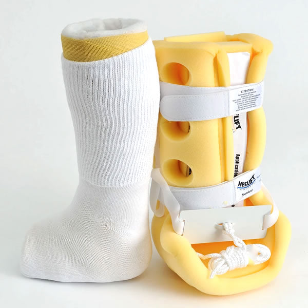 White bariatric medical sock next to a cast